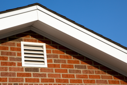 Roofing company in ann arbor shows a picture of a properly ventilated roof