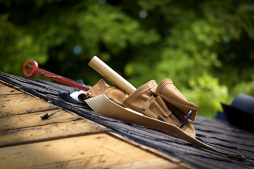 Roofing contractors in ann arbor working on a roof