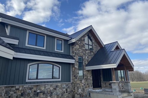 Wilderness Construction completed a siding replacement project on a new home in Ann Arbor, MI 